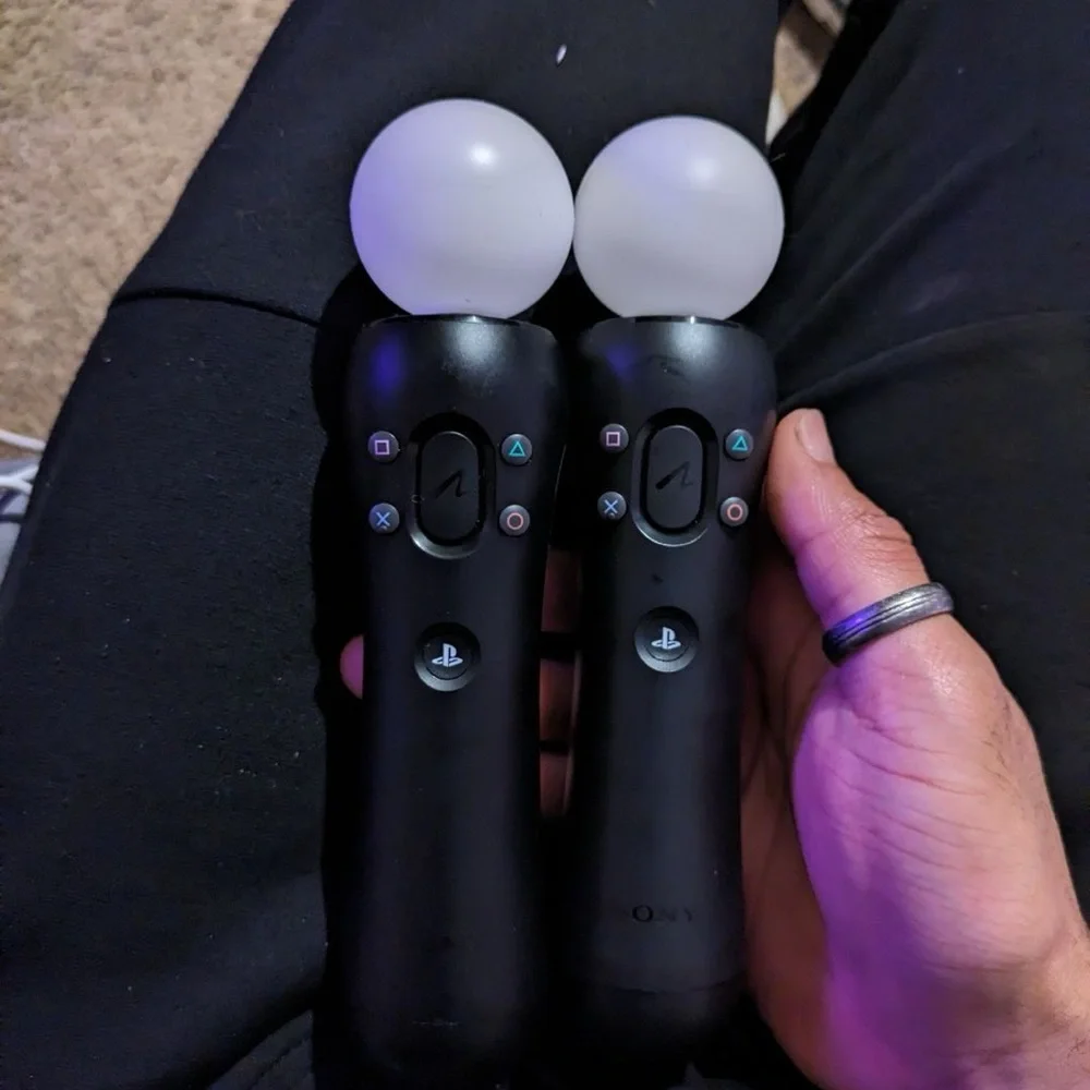 hardly used VR with the two controllers and all the cords with Spider-Man VR